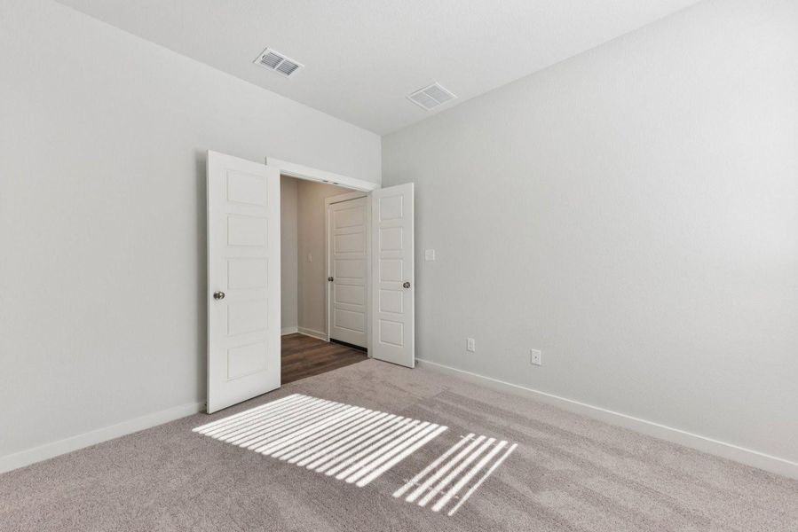 Spacious, unfurnished interior of a new home in Stallion Run, Buda (Image 32).