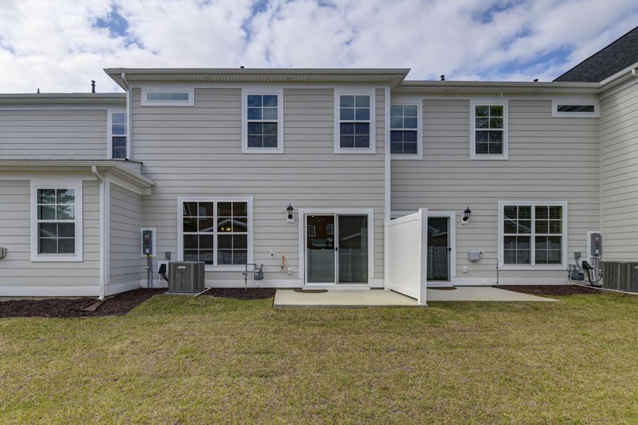 Exterior details and patio area of a home in Lake Carolina Townhomes, Columbia (Image 31).