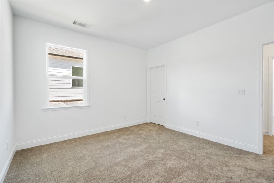 Representative unfurnished interior of a home built from the Ingram by Taylor Morrison in Falls Creek, Flowery Branch (Image 47).