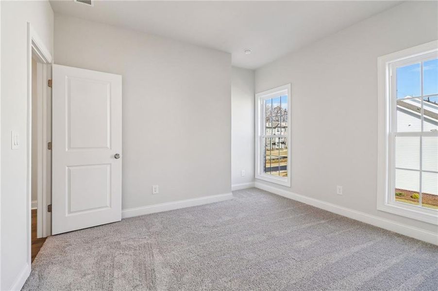Spacious, unfurnished interior of a new home in Brackley Single Family, Cumming (Image 22). Spacious, unfurnished interior of a new home in Brackley Single Family, Cumming (Image 22).