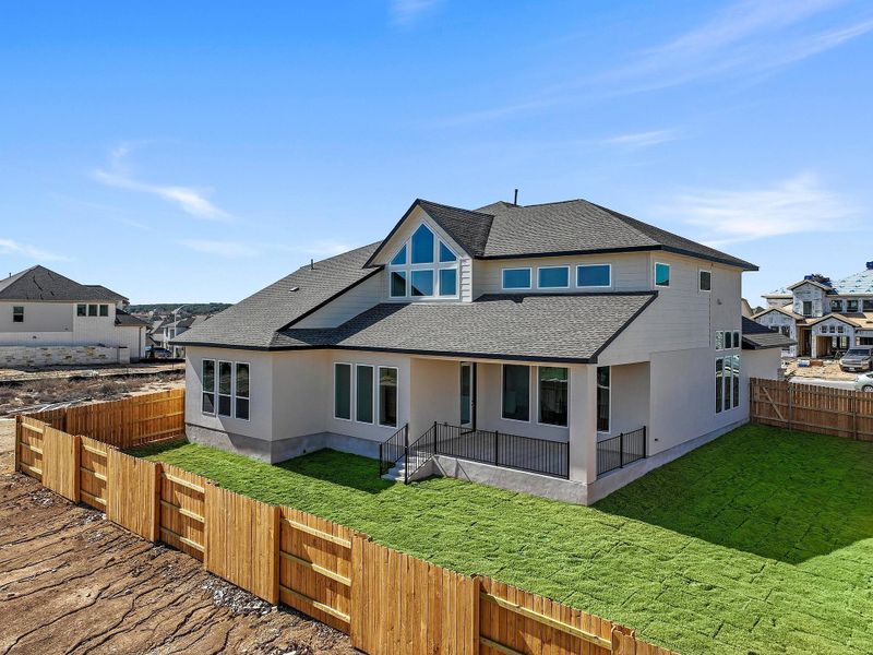 Exterior details and patio area of a home in Lariat, Liberty Hill (Image 23).