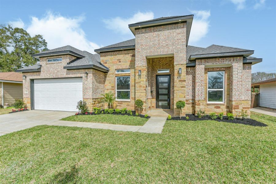 Front exterior of a new home in , Pasadena, TX, highlighting curb appeal (Image 26). Front exterior of a new home in , Pasadena, TX, highlighting curb appeal (Image 26).