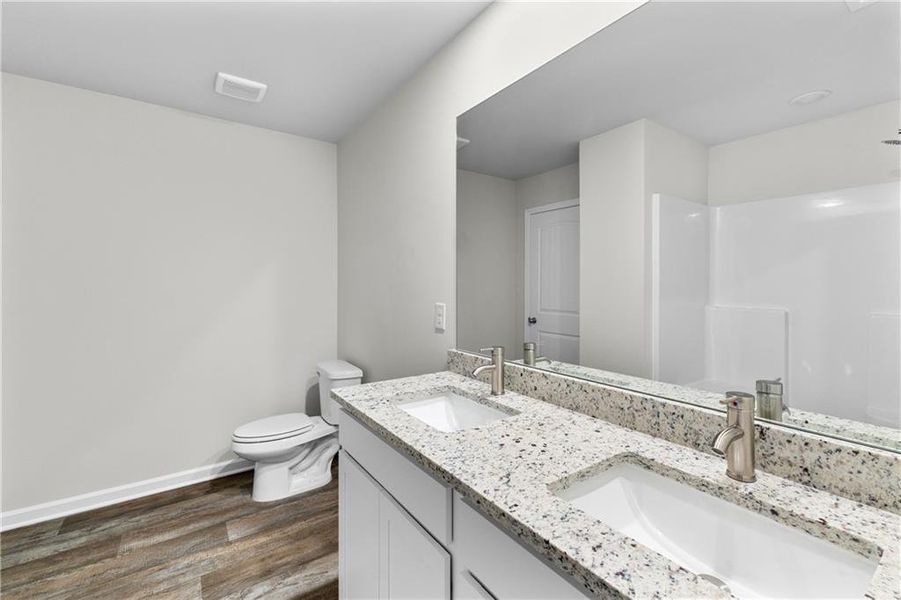 Furnished interior view inside a new home in The Grove At Mundy Mill, Gainesville (Image 7).