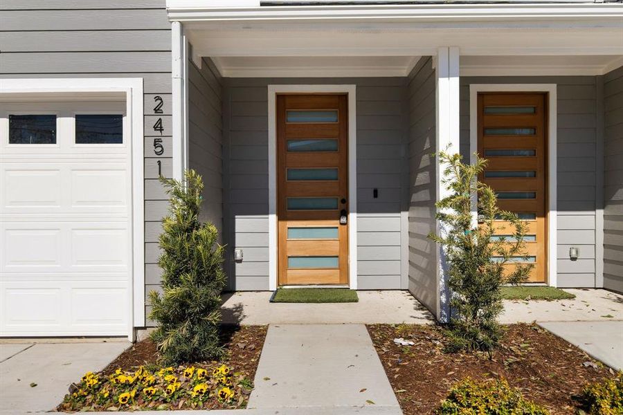 Property entrance featuring a garage