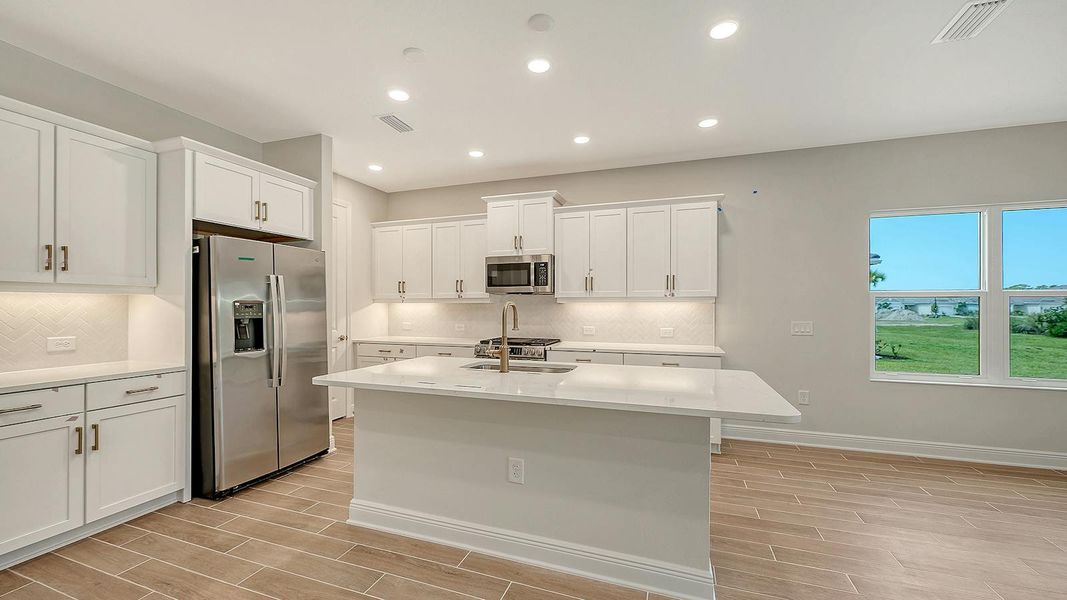 Furnished interior view inside a new home in Grand Park Real Estate and Homes for Sale in Sarasota, FL - Neal Communities, Sarasota (Image 8).
