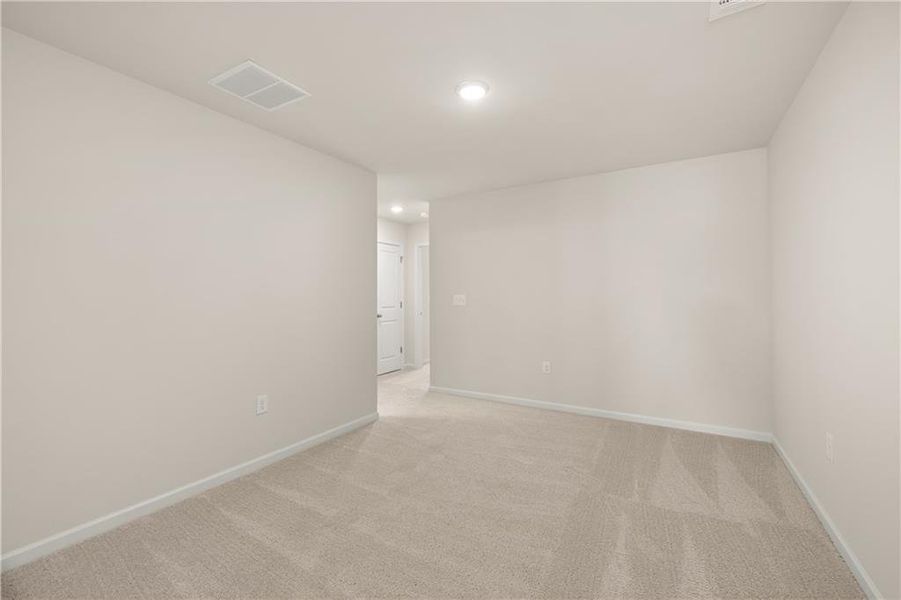Spacious, unfurnished interior of a new home in Lake Carlton, Loganville (Image 22).