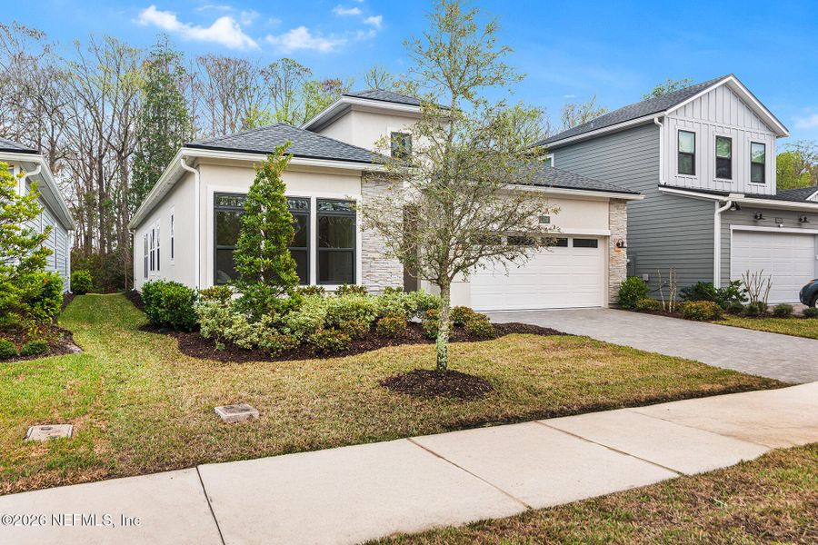 Front exterior of a new home in , Jacksonville, FL, highlighting curb appeal (Image 25).