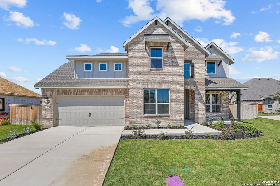 Front exterior of a new home in Megan's Landing 50', Castroville, TX, highlighting curb appeal (Image 16). Front exterior of a new home in Megan's Landing 50', Castroville, TX, highlighting curb appeal (Image 16).