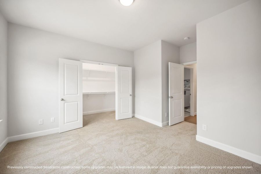 Room to Grow. The spacious secondary bedroom features a walk-in closet and plenty of natural light.