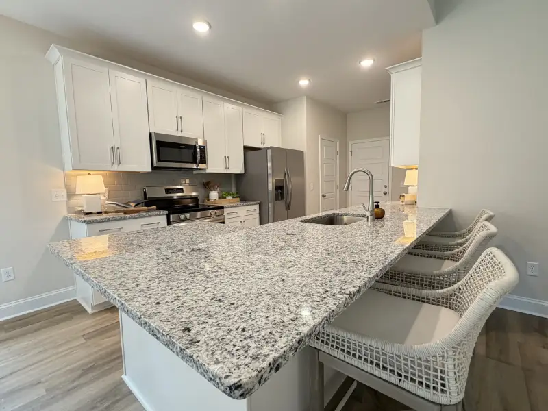 Furnished interior view inside a new home in Parkwood Estates, Leland (Image 5).