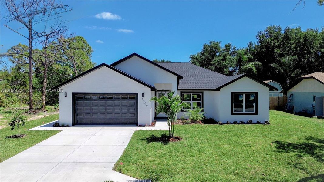 Front exterior of a new home in , Sebring, FL, highlighting curb appeal (Image 2). Front exterior of a new home in , Sebring, FL, highlighting curb appeal (Image 2).