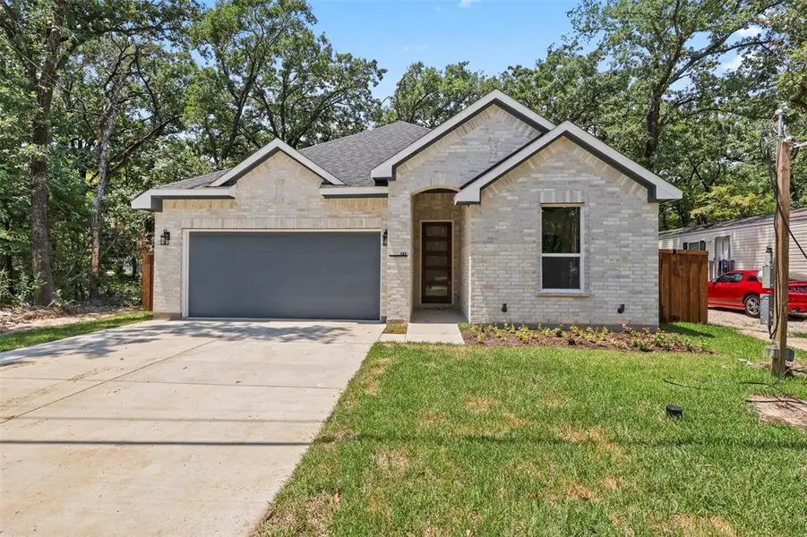 Front exterior of a new home in , Mabank, TX, highlighting curb appeal (Image 1). Front exterior of a new home in , Mabank, TX, highlighting curb appeal (Image 1).