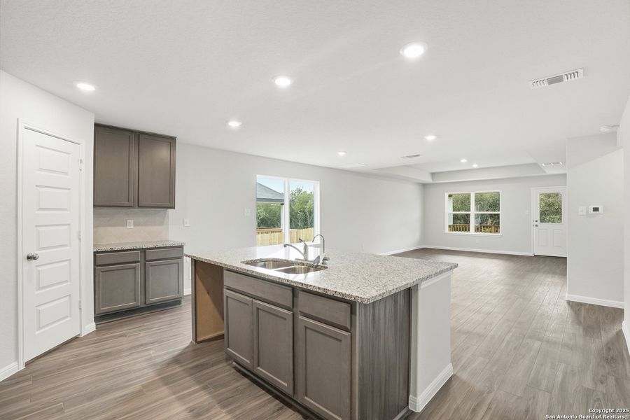 Furnished interior view inside a new home in Hunters Ranch, San Antonio (Image 14).