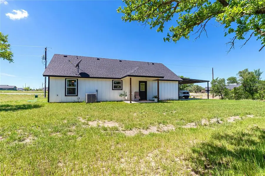 Exterior details and patio area of a home in , Azle (Image 19).