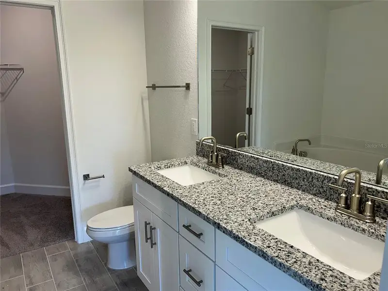 Furnished interior view inside a new home in Watercress Cove, North Port (Image 7). Furnished interior view inside a new home in Watercress Cove, North Port (Image 7).