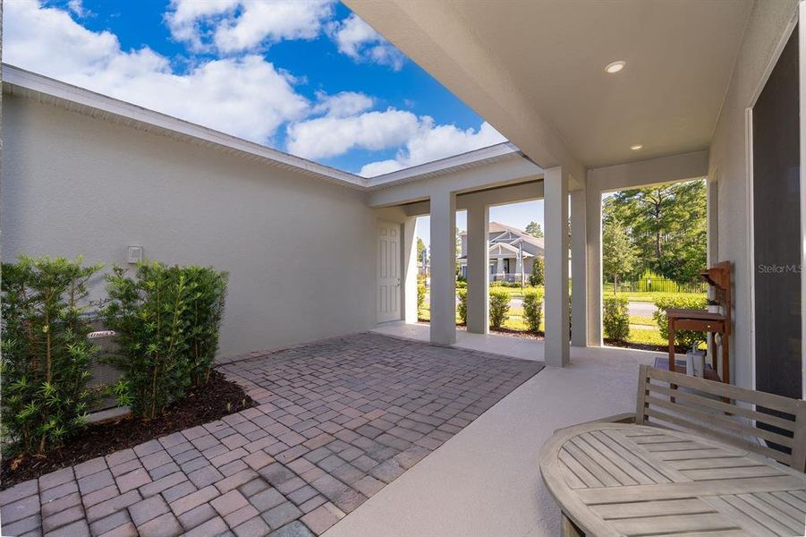 Exterior details and patio area of a home in Serenade at Ovation, Winter Garden (Image 3).