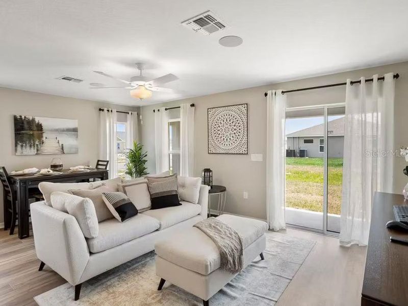Furnished interior view inside a new home in Harbor at Lake Henry - Townhomes, Winter Haven (Image 10).