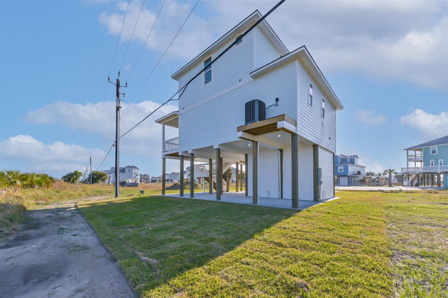Exterior details and patio area of a home in , Galveston (Image 31).