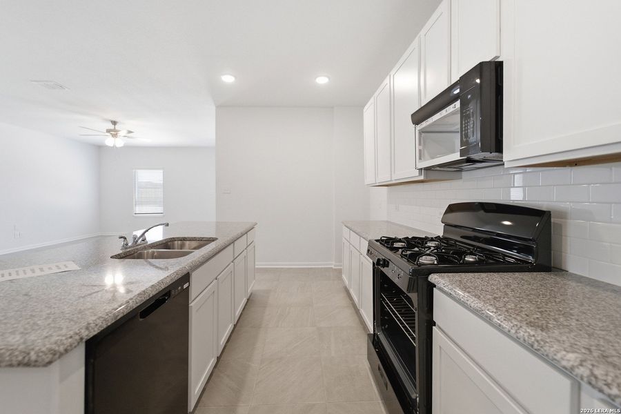 Furnished interior view inside a new home in Red Hawk Landing, San Antonio (Image 11).