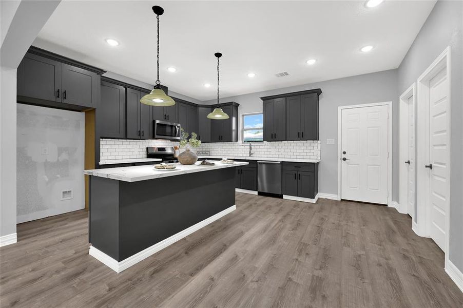 Beautiful kitchen with  quartz countertops