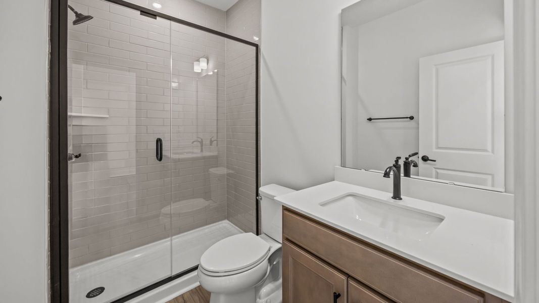 The Drayton Plan by DRB Homes in McBride Indian Trail, NC -Bathroom 1