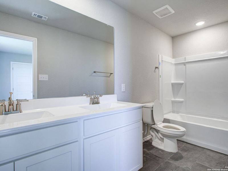 Furnished interior view inside a new home in Comanche Ridge, San Antonio (Image 12).