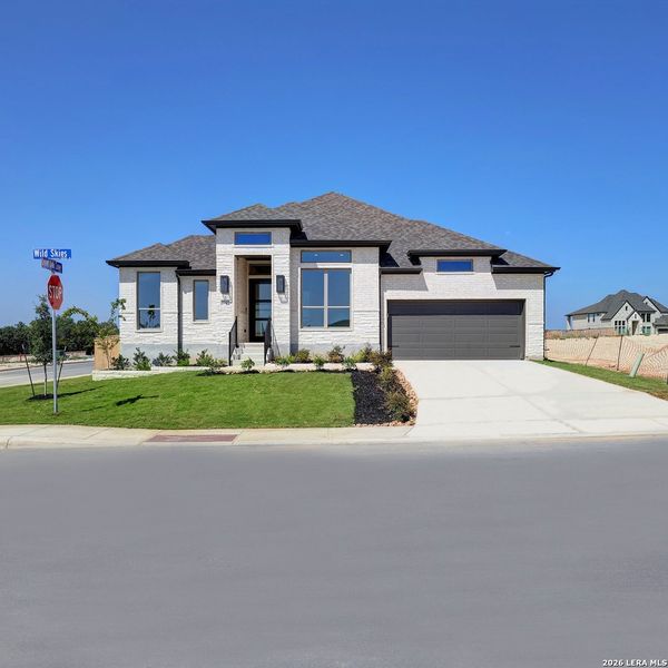 Front exterior of a new home in Ladera, San Antonio, TX, highlighting curb appeal (Image 19).