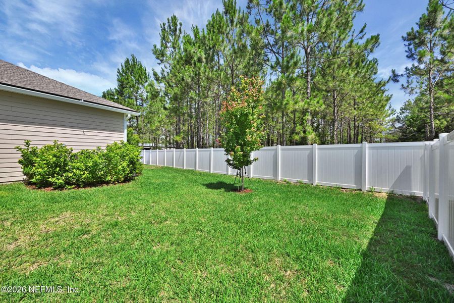 Exterior details and patio area of a home in , Yulee (Image 35).