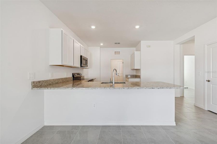 Furnished interior view inside a new home in Southpointe, Palmetto (Image 6).
