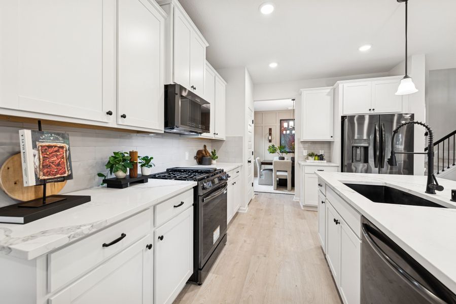 The Princeton II- Kitchen. Staged model home shown for illustration only; actual features, colors, and upgrades may vary. The Princeton II- Kitchen. Staged model home shown for illustration only; actual features, colors, and upgrades may vary.