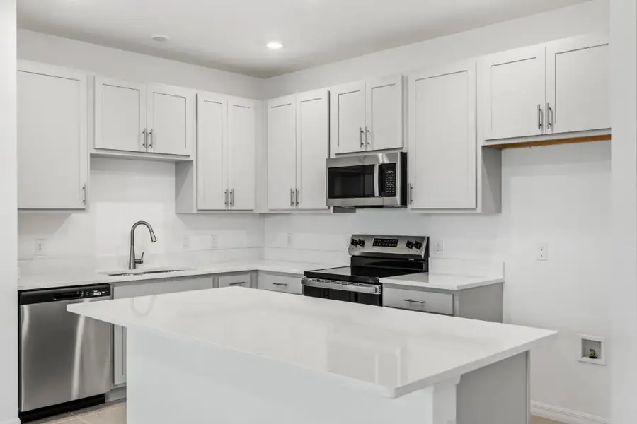 Furnished interior view inside a new home in Catamaran Cove, Rockledge (Image 6).