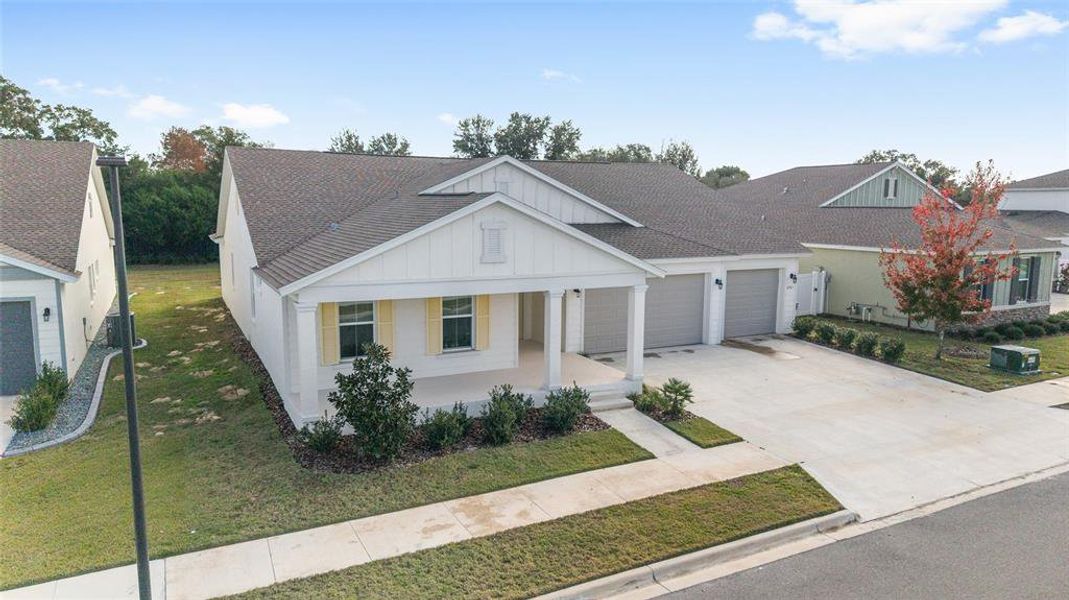 Front exterior of a new home in Calesa Township, Ocala, FL, highlighting curb appeal (Image 29).