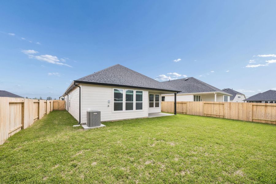 Exterior details and patio area of a home in Montgomery Bend, Montgomery (Image 4).