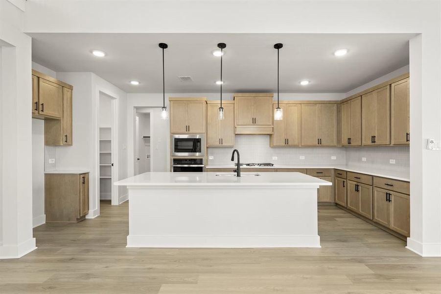 Furnished interior view inside a new home in Discovery Collection at Union Park, Little Elm (Image 7).