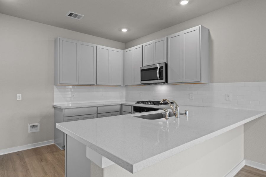 Furnished interior view inside a new home in Laurel Landing 40', Alvin (Image 6). Furnished interior view inside a new home in Laurel Landing 40', Alvin (Image 6).