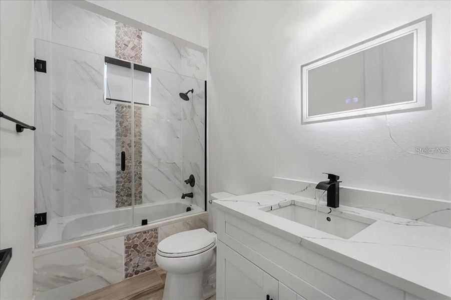 Furnished interior view inside a new home in , Port Charlotte (Image 30).