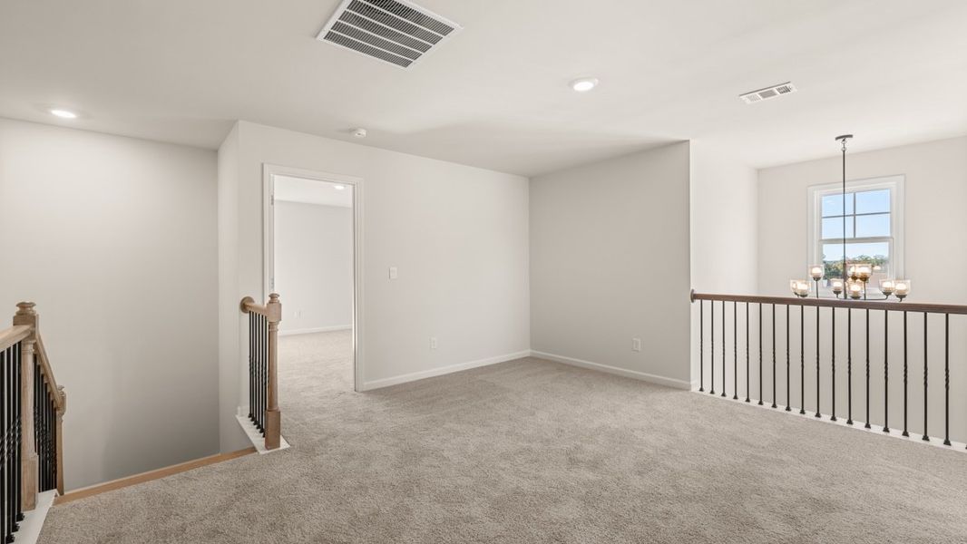 Representative unfurnished interior of a home built from the WINDSOR by D.R. Horton in Butner Estates, South Fulton (Image 54).
