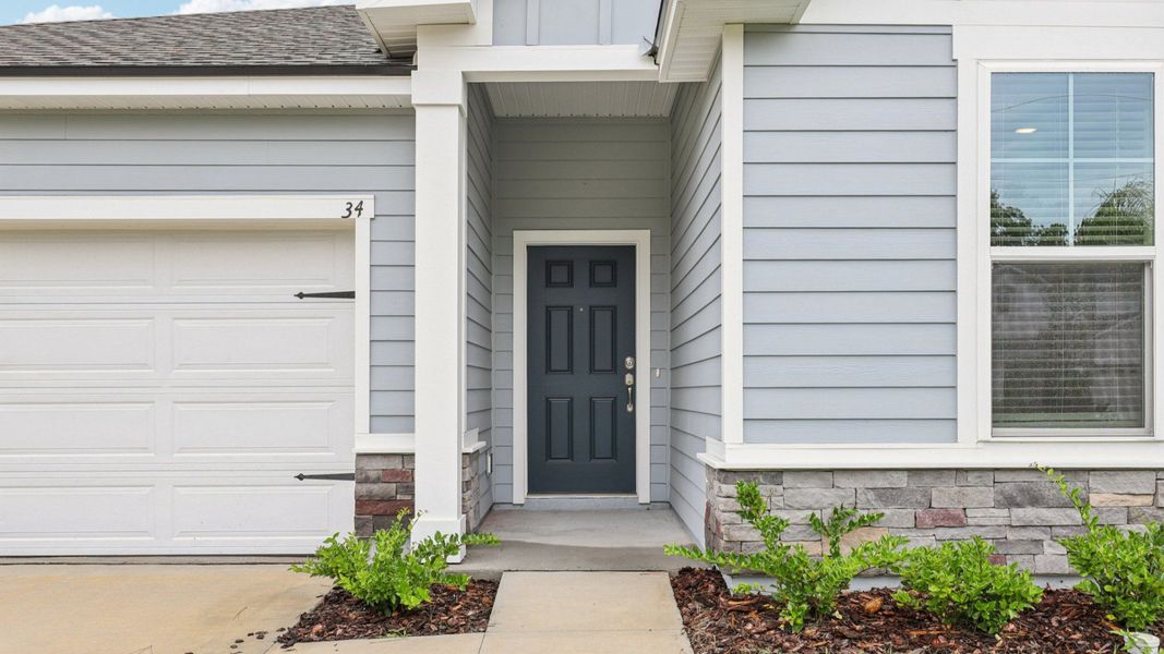 Exterior details and patio area of a home in Palm Coast, Palm Coast (Image 2).