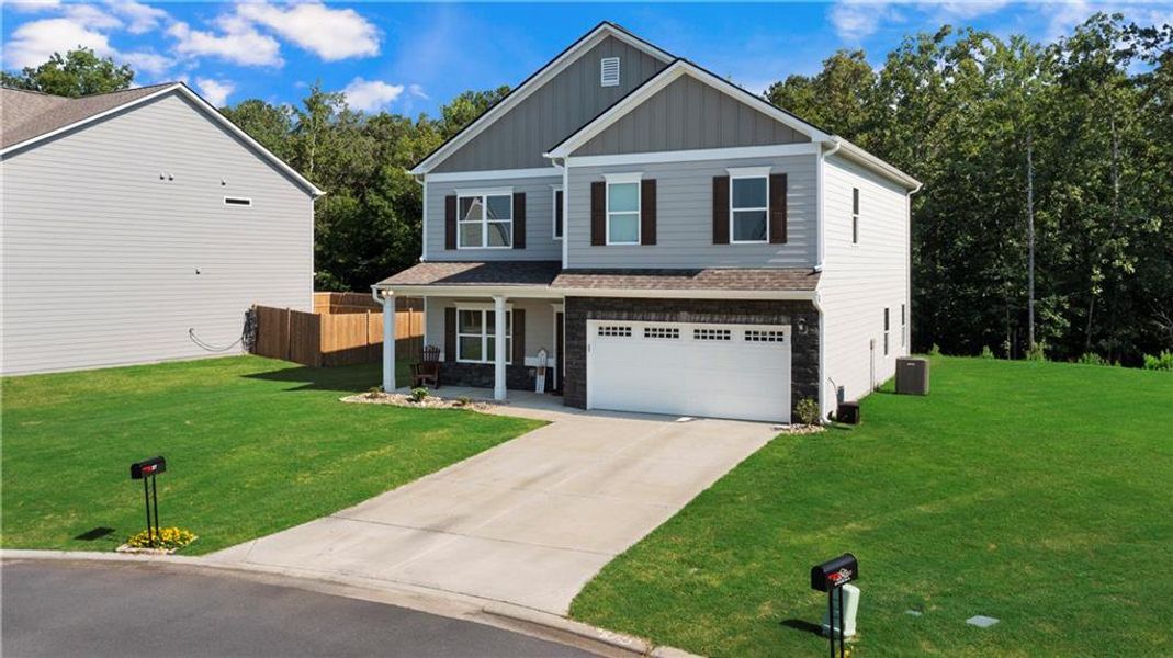 Front exterior of a new home in , Rome, GA, highlighting curb appeal (Image 24). Front exterior of a new home in , Rome, GA, highlighting curb appeal (Image 24).