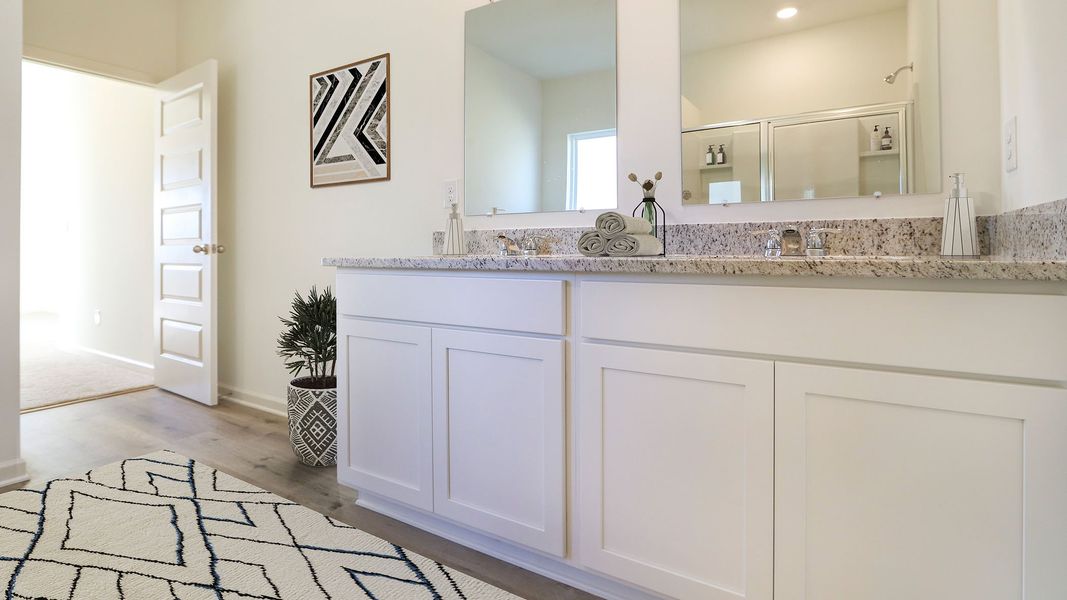 Furnished interior view inside a new home in Magnolia at the Bluffs Phase 3, Freeport (Image 16). Furnished interior view inside a new home in Magnolia at the Bluffs Phase 3, Freeport (Image 16).