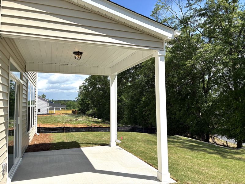 Front exterior of a new home in Holly Ridge, Greenville, SC, highlighting curb appeal (Image 2). Front exterior of a new home in Holly Ridge, Greenville, SC, highlighting curb appeal (Image 2).