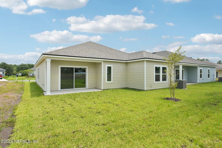 Exterior details and patio area of a home in Panther Creek, Jacksonville (Image 3).