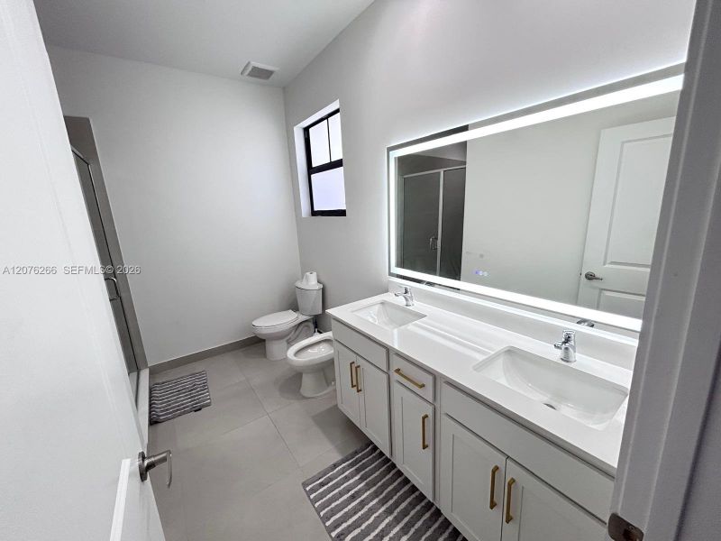 Furnished interior view inside a new home in , Miami (Image 15). Furnished interior view inside a new home in , Miami (Image 15).