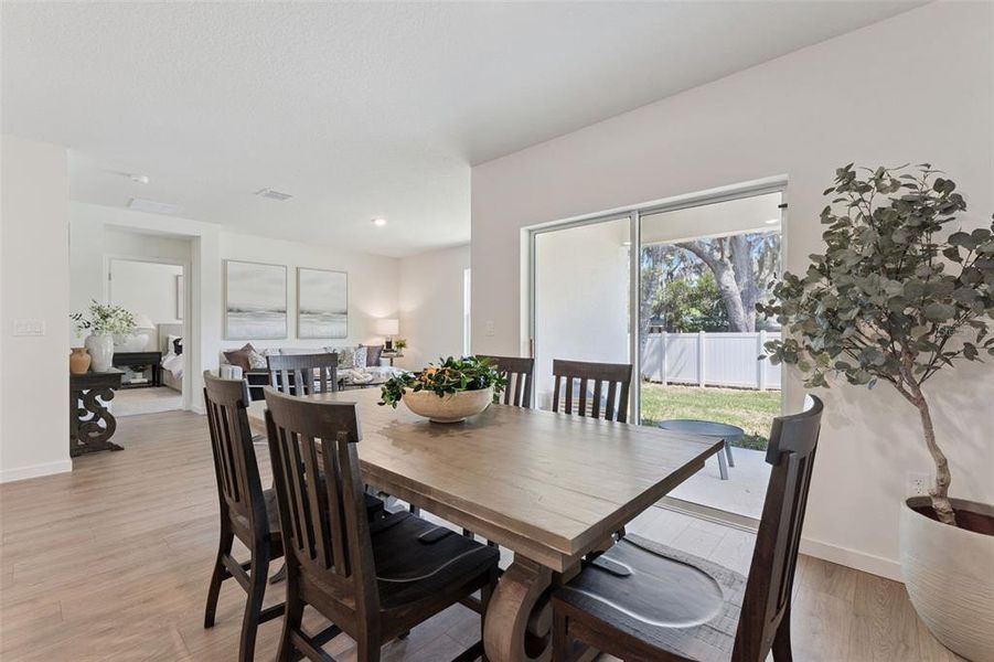 Furnished interior view inside a new home in Crossroads at Kelly Park, Apopka (Image 9).