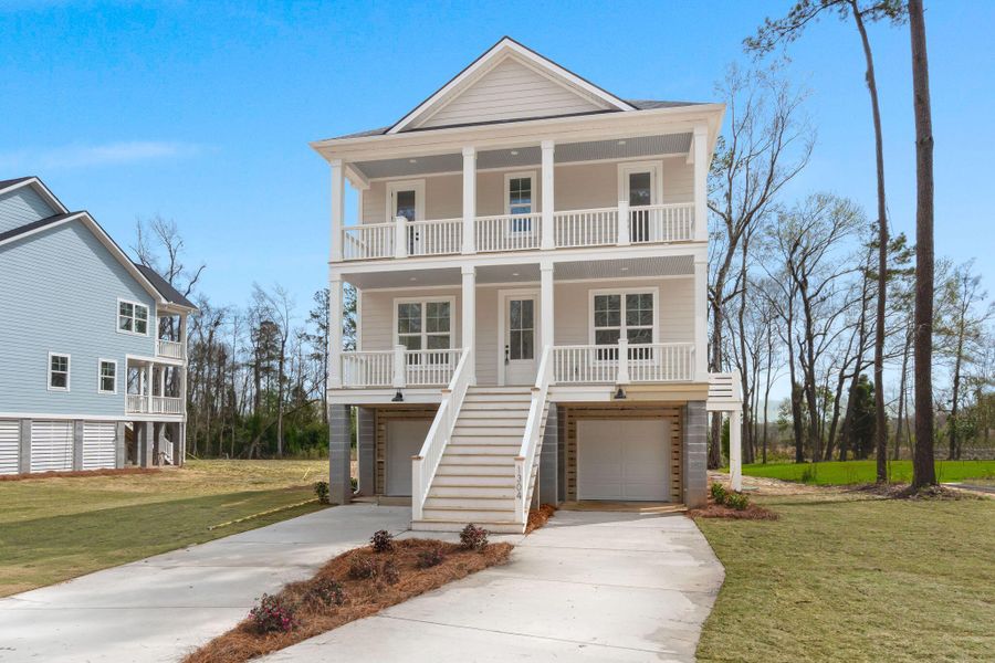 Front exterior of a new home in , Moncks Corner, SC, highlighting curb appeal (Image 13).