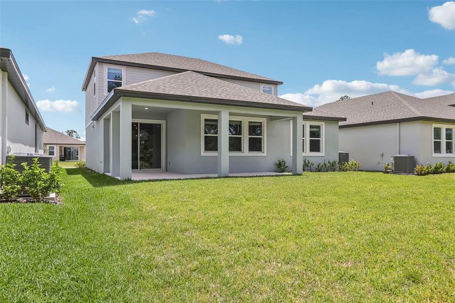 Exterior details and patio area of a home in Legends Preserve - Signature Series, Daytona Beach (Image 4).