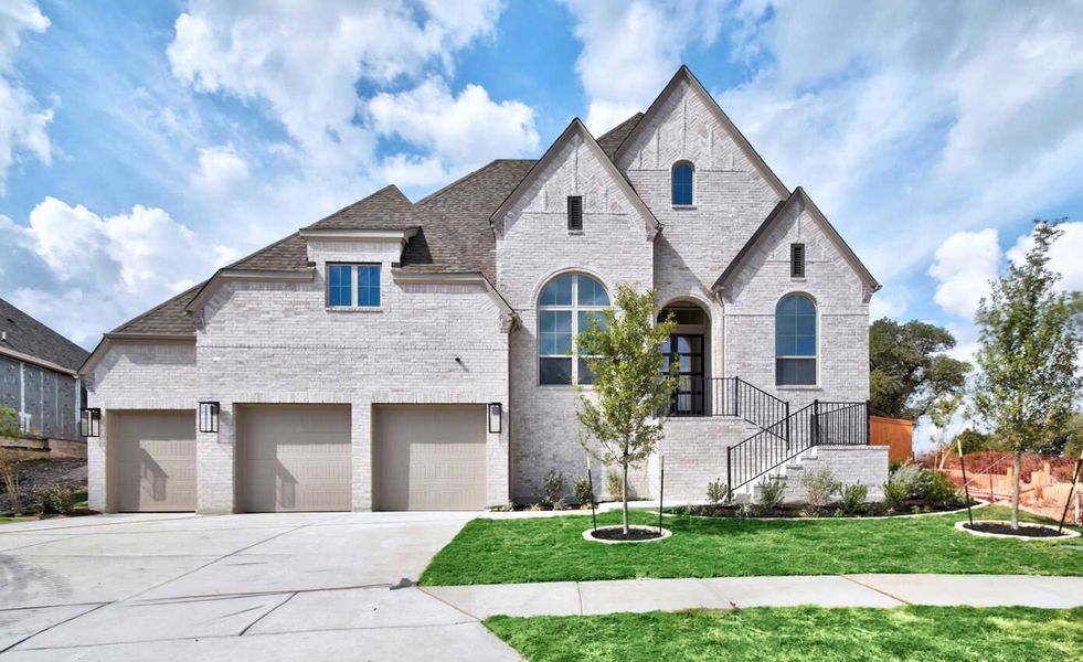 Front exterior of a new home in La Cima: 70ft. lots, San Marcos, TX, highlighting curb appeal (Image 1).