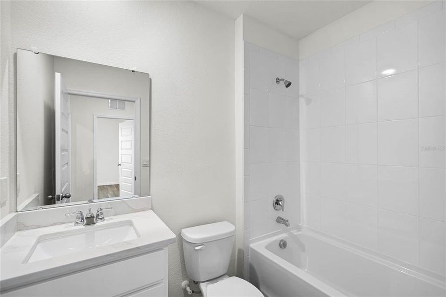 Furnished interior view inside a new home in , Winter Haven (Image 7). Furnished interior view inside a new home in , Winter Haven (Image 7).