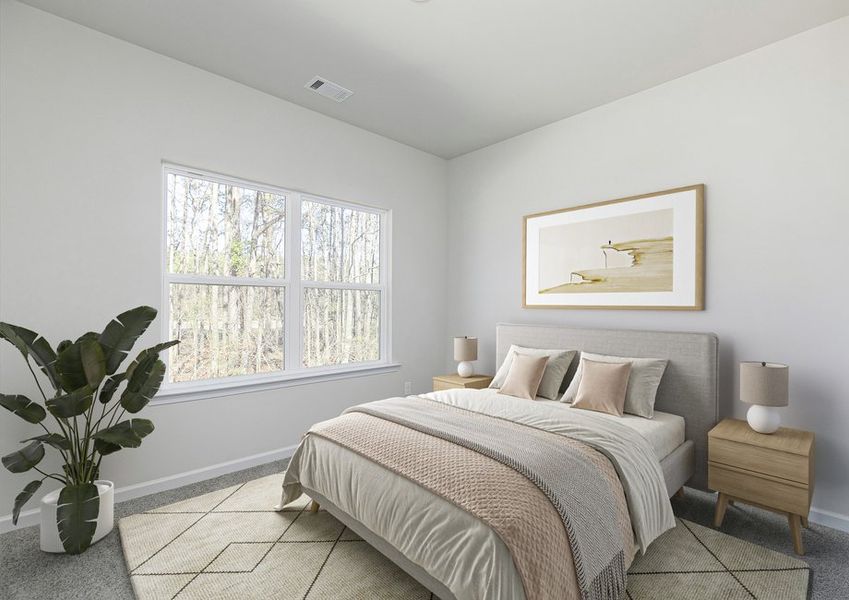 Rest and relaxation await in the master bedroom