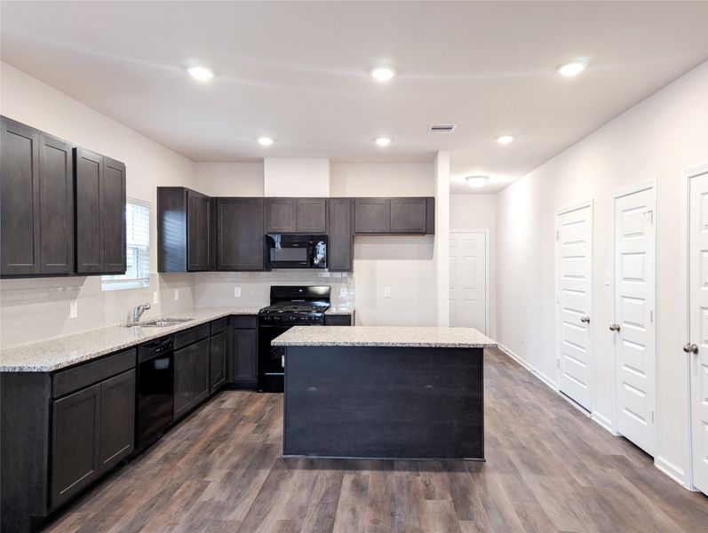 Open concept - kitchen open to dining area and family room